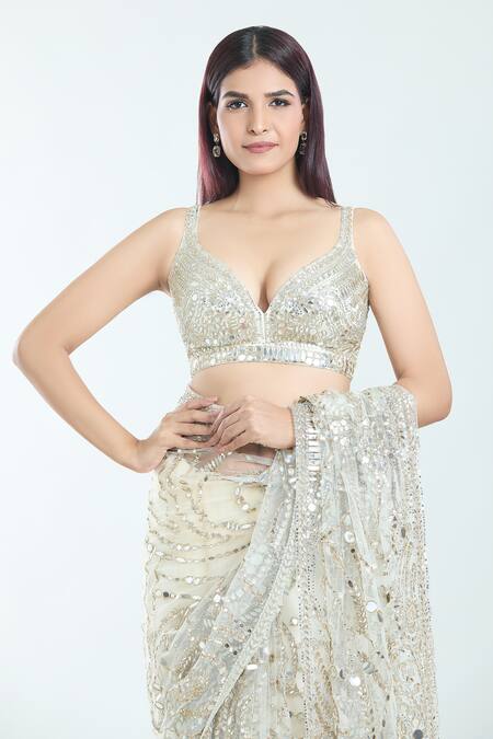 Seema Gujral White Silk Mirrors, Zari, Embroidery Plunge Neck Paisley Saree With Blouse at Aza Fashions Seema Gujral_White Silk Mirrors, Zari, Embroidery Plunge Neck Paisley Saree With Blouse_at_Aza_Fashions