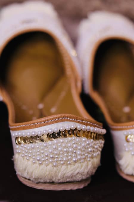 Loryphilory Ivory Glitz Pearl Embellished Juttis Online at Aza Fashions Loryphilory_Ivory Glitz Pearl Embellished Juttis _Online_at_Aza_Fashions