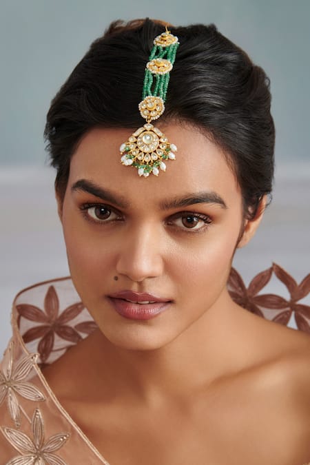 Buy Paisley Pop Green Floral Motif Carved Maangtikka Online at Aza Fashions Buy_Paisley Pop_Green Floral Motif Carved Maangtikka _Online_at_Aza_Fashions