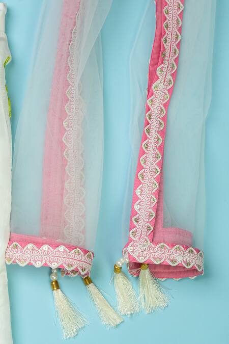 Yuvraani Jaipur_Ivory Polyester, Net Embroidery, Tassels Hand Lehenga Set _at_Aza_Fashions
