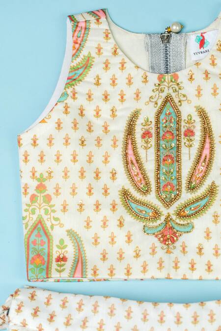 Yuvraani Jaipur_Ivory Chanderi, Net Embroidery, Tassels Floral Print Lehenga Blouse Set _at_Aza_Fashions