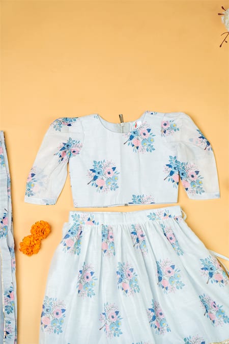 Yuvraani Jaipur_Blue Chanderi, Net Embroidery, Lace, Tassels Floral Print Blouse And Lehenga Set _Online_at_Aza_Fashions