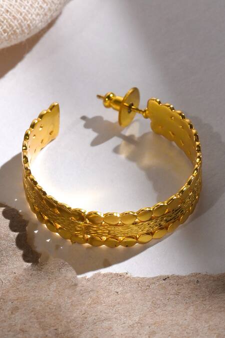 Heena Mittal Gold Plated Cut Work Suni Textured Hoops at Aza Fashions Heena Mittal_Gold Plated Cut Work Suni Textured Hoops _at_Aza_Fashions