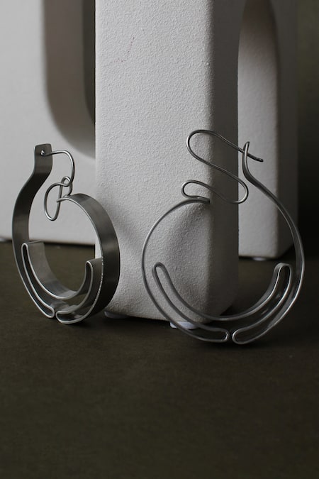 Shop_Heena Mittal_Silver Plated Orion Rippling Ribbon Hoops _at_Aza_Fashions