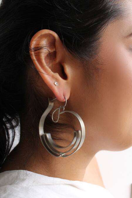 Heena Mittal_Silver Plated Orion Rippling Ribbon Hoops _at_Aza_Fashions