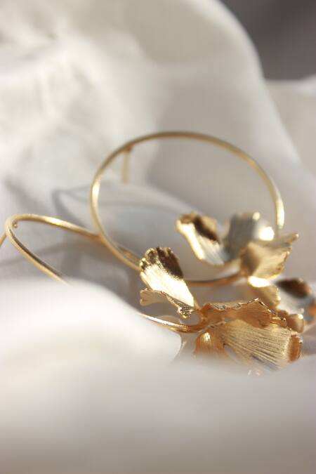 Heena Mittal Gold Plated Fiore Girdle Petal Hoops at Aza Fashions Heena Mittal_Gold Plated Fiore Girdle Petal Hoops _at_Aza_Fashions