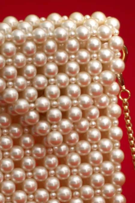 Shop_Amyra_White Bora Pearl Embellished Mobile Cover_Online_at_Aza_Fashions