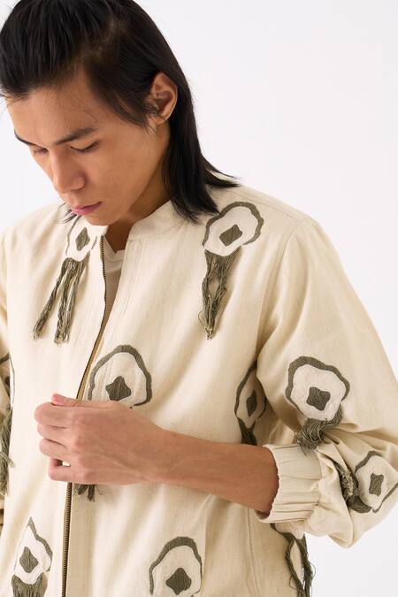 Three Ivory Handloom Cotton Embroidered Thread Fringe Bomber Jacket at Aza Fashions Three_Ivory Handloom Cotton Embroidered Thread Fringe Bomber Jacket _at_Aza_Fashions