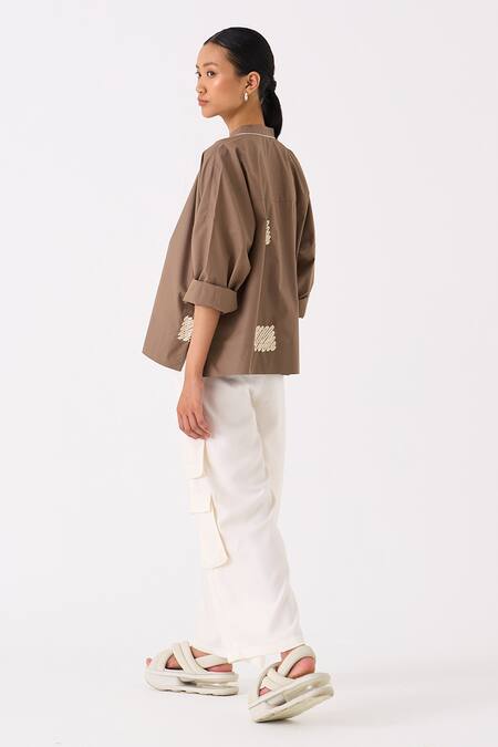 Shop Three Ivory Tencel Knee Patch Pocket Cargo Pant at Aza Fashions Shop_Three_Ivory Tencel Knee Patch Pocket Cargo Pant _at_Aza_Fashions