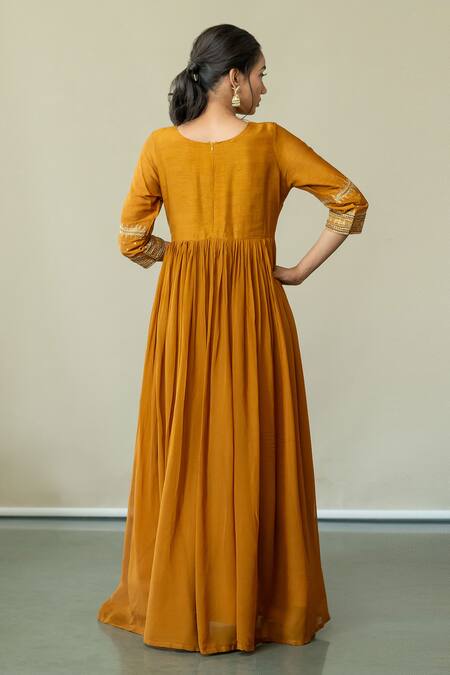 Shop World of Sugandh Yellow Silk Embroidery Round Neck Cosmic Blossom Gown at Aza Fashions Shop_World of Sugandh_Yellow Silk Embroidery Round Neck Cosmic Blossom Gown _at_Aza_Fashions