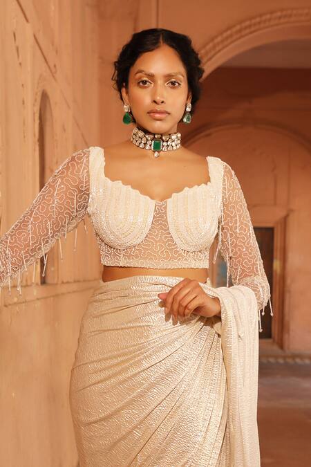 Shop Niamh By Kriti Ivory Silk, Crepe Pre-draped Textured Saree With Wave Embellished Blouse Online at Aza Fashions Shop_Niamh By Kriti_Ivory Silk, Crepe Pre-draped Textured Saree With Wave Embellished Blouse _Online_at_Aza_Fashions