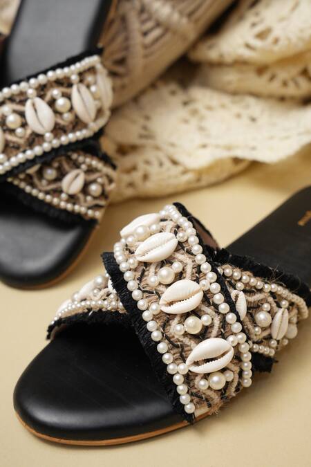 Shop Jutti Express Black Cowrie Shells And Pearl Embellished Cross Strap Flats Online at Aza Fashions Shop_Jutti Express_Black Cowrie Shells And Pearl Embellished Cross Strap Flats _Online_at_Aza_Fashions