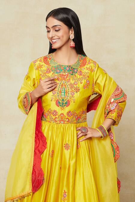 Debyani + CO Yellow Silk Embroidery Round Neck Peplum Kurta Sharara Set at Aza Fashions Debyani + CO_Yellow Silk Embroidery Round Neck Peplum Kurta Sharara Set _at_Aza_Fashions
