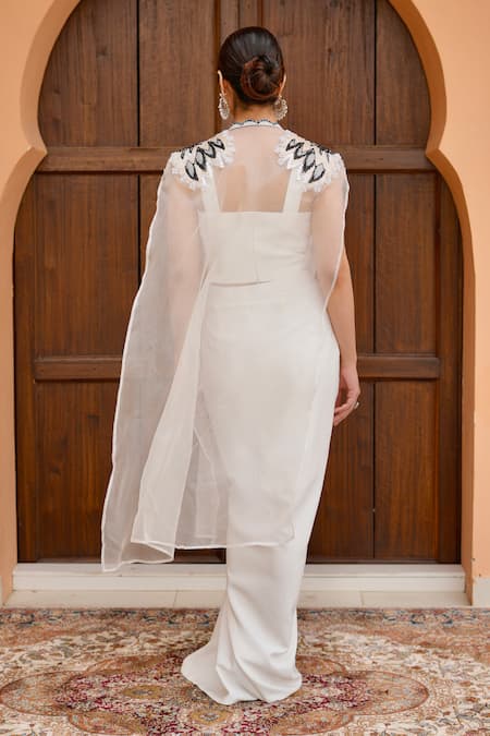 Shop Nidhi Kejriwal Off White Organza Cut Work, Embellished Draped Dhoti Skirt Set With Cape at Aza Fashions Shop_Nidhi Kejriwal_Off White Organza Cut Work, Embellished Draped Dhoti Skirt Set With Cape _at_Aza_Fashions