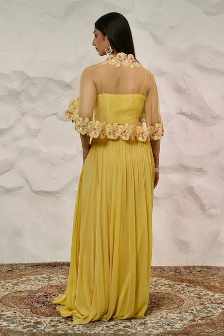 Shop Nidhi Kejriwal Yellow Net, Georgette, Silk Sequins, Cut Work Embellished Pleated Skirt Cape Set at Aza Fashions Shop_Nidhi Kejriwal_Yellow Net, Georgette, Silk Sequins, Cut Work Embellished Pleated Skirt Cape Set _at_Aza_Fashions