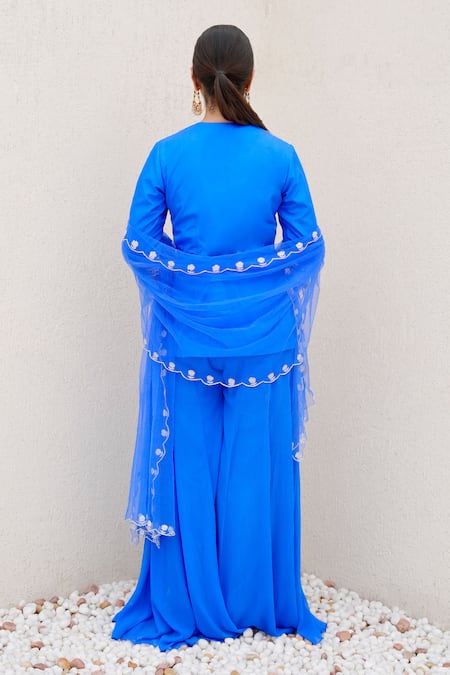 Shop Nidhi Kejriwal Blue Silk, Net, Chiffon Bird Motif Embellished Short Kurta Palazzo Set at Aza Fashions Shop_Nidhi Kejriwal_Blue Silk, Net, Chiffon Bird Motif Embellished Short Kurta Palazzo Set _at_Aza_Fashions