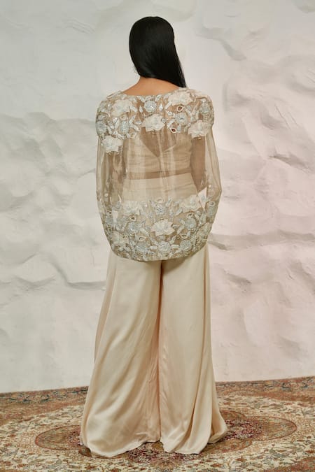 Shop Nidhi Kejriwal Beige Georgette, Satin, Tissue Zari, Bustier Palazzo Set With Embroidered Cape at Aza Fashions Shop_Nidhi Kejriwal_Beige Georgette, Satin, Tissue Zari, Bustier Palazzo Set With Embroidered Cape _at_Aza_Fashions