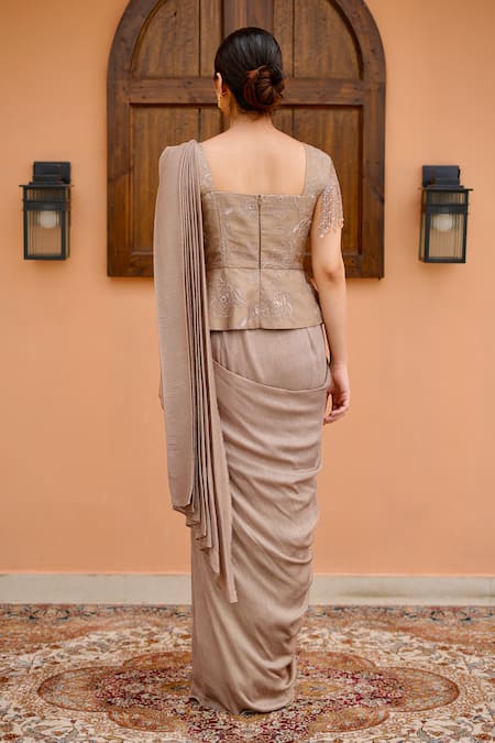 Shop Nidhi Kejriwal Pink Georgette Cut Work, Sequins Embroidered Pre-draped Saree With Peplum Blouse at Aza Fashions Shop_Nidhi Kejriwal_Pink Georgette Cut Work, Sequins Embroidered Pre-draped Saree With Peplum Blouse _at_Aza_Fashions