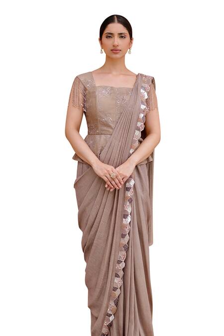 Nidhi Kejriwal Pink Georgette Cut Work, Sequins Embroidered Pre-draped Saree With Peplum Blouse Online at Aza Fashions Nidhi Kejriwal_Pink Georgette Cut Work, Sequins Embroidered Pre-draped Saree With Peplum Blouse _Online_at_Aza_Fashions