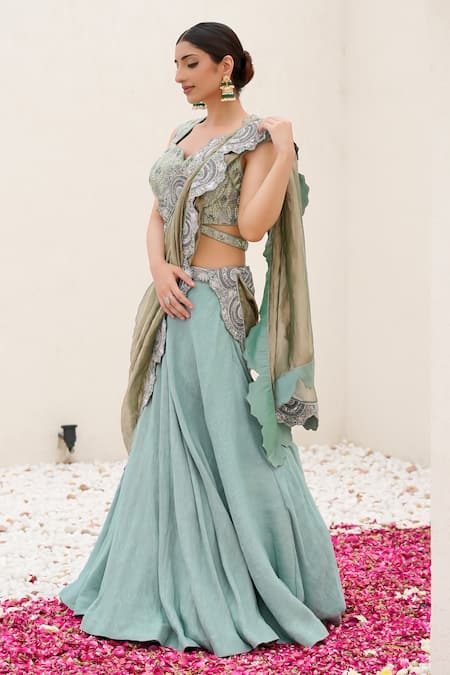 Nidhi Kejriwal Green Brocade Hand Embroidered Pearl Notched Lehenga Blouse Set  3