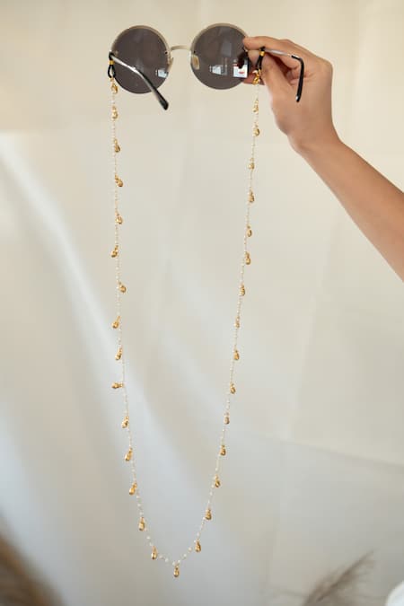 Shop_Do Taara_Gold Plated Ghungroo Pearl Embellished Eyewear Sling _at_Aza_Fashions
