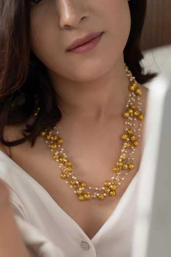 Buy Do Taara Gold Plated Shell Pearl Embellished Layered Necklace Online at Aza Fashions Buy_Do Taara_Gold Plated Shell Pearl Embellished Layered Necklace _Online_at_Aza_Fashions