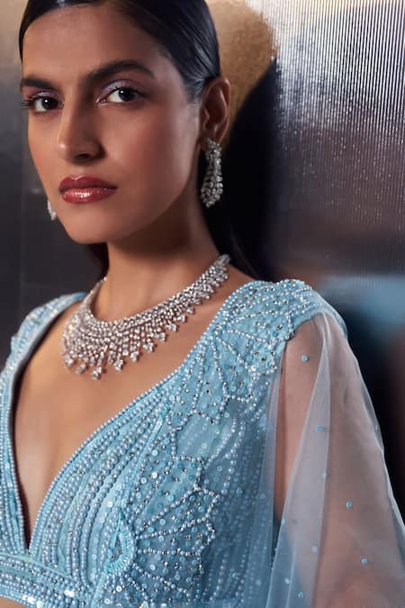 Angad Singh Blue Net Pearls, Sequins, Crystals Plunge Neck Embroidered Bridal Lehenga Set at Aza Fashions Angad Singh_Blue Net Pearls, Sequins, Crystals Plunge Neck Embroidered Bridal Lehenga Set _at_Aza_Fashions