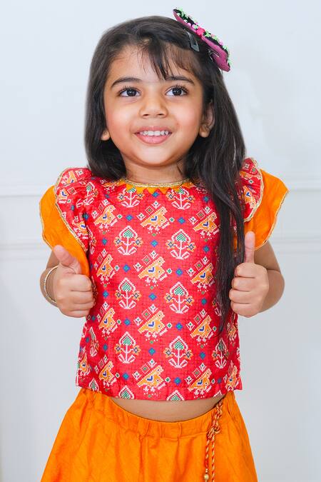 Shop_Pankhuri By Priyanka_Red Cotton Tassels, Beads, Lace Patola Pattern Layered Lehenga With Blouse _Online_at_Aza_Fashions