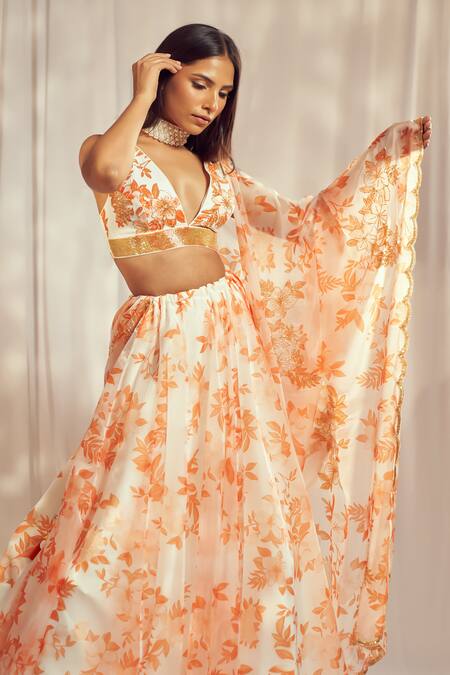 Harshita Singhvi_Orange Organza, Silk Cut Work, Embroidery Plunge French Bloom Print Lehenga Set _at_Aza_Fashions