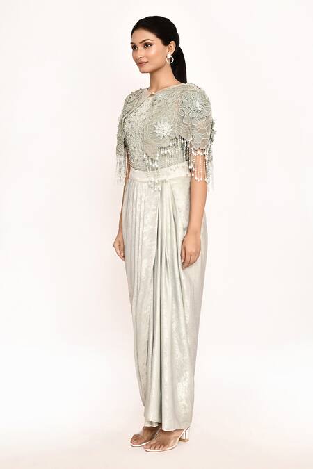 Eeksha_Ivory Lycra, Faux Leather Embroidery, Fringe Round Neck Floral Cape Skirt Set _at_Aza_Fashions