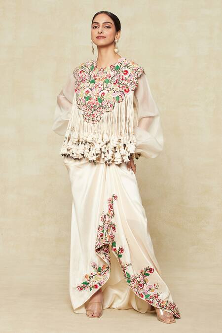 Anamika Khanna White Silk, Satin Tassels, Embroidery Asymmetric, Round Neck Cape Skirt Set at Aza Fashions Anamika Khanna_White Silk, Satin Tassels, Embroidery Asymmetric, Round Neck Cape Skirt Set_at_Aza_Fashions