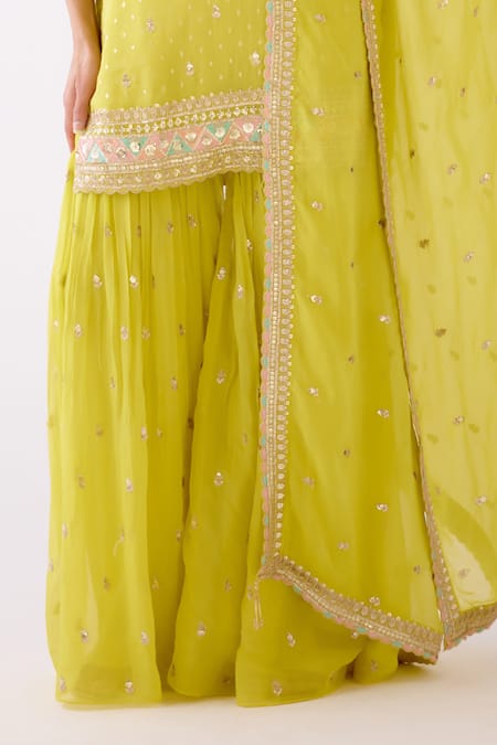 Basanti - Kapde Aur Koffee Yellow Organza Sequins, Embroidery V-neck Butti Kurta Sharara Set at Aza Fashions Basanti - Kapde Aur Koffee_Yellow Organza Sequins, Embroidery V-neck Butti Kurta Sharara Set _at_Aza_Fashions