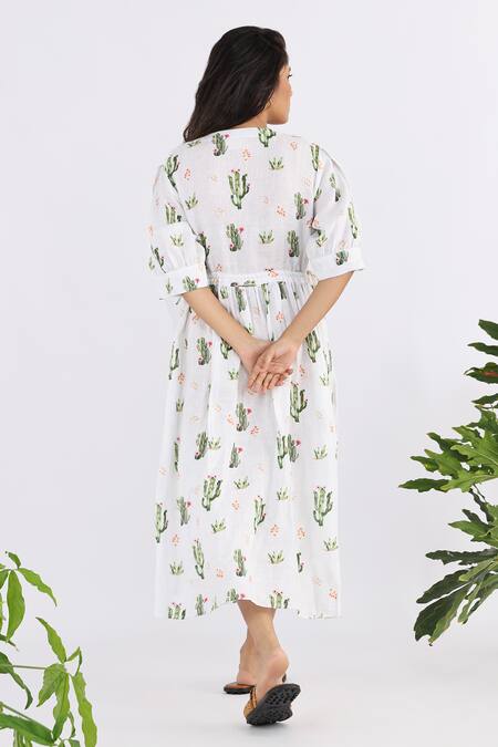 Shop Studio Moda India White Linen V-neck Cactus Seamless Print Cross Yoke Midi Dress at Aza Fashions Shop_Studio Moda India_White Linen V-neck Cactus Seamless Print Cross Yoke Midi Dress_at_Aza_Fashions