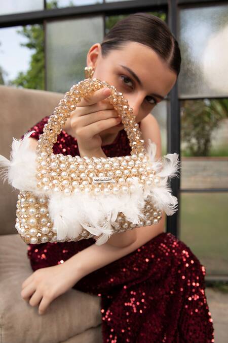 Shop Modarta White Pearls, Feathers, Beads Handbag With Online at Aza Fashions Shop_Modarta_White Pearls, Feathers, Beads Handbag With _Online_at_Aza_Fashions