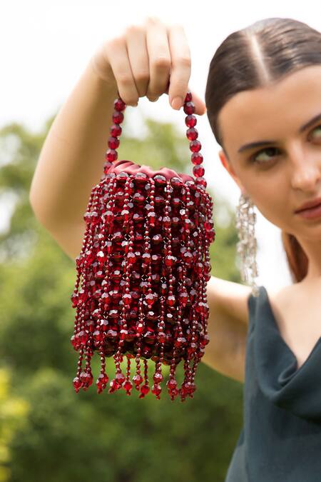 Buy Modarta Maroon Beads Embellished Wristlet Bag Online at Aza Fashions Buy_Modarta_Maroon Beads Embellished Wristlet Bag _Online_at_Aza_Fashions