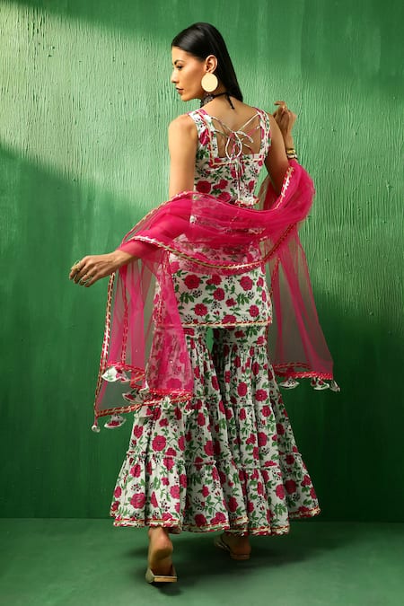 Shop Pomcha Jaipur Pink Cotton, Net Embroidery, Gota Patti, Tassels Blossom Pattern Sharara Set at Aza Fashions Shop_Pomcha Jaipur_Pink Cotton, Net Embroidery, Gota Patti, Tassels Blossom Pattern Sharara Set _at_Aza_Fashions