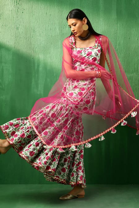 Shop Pomcha Jaipur Pink Cotton, Net Embroidery, Gota Patti, Tassels Blossom Pattern Sharara Set Online at Aza Fashions Shop_Pomcha Jaipur_Pink Cotton, Net Embroidery, Gota Patti, Tassels Blossom Pattern Sharara Set _Online_at_Aza_Fashions