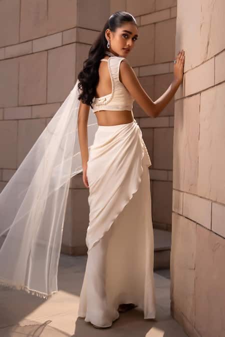 Shop Seeaash White Net, Crepe Pearls, Sequins, Embroidered Pre-draped Saree And Harness Set at Aza Fashions Shop_Seeaash_White Net, Crepe Pearls, Sequins, Embroidered Pre-draped Saree And Harness Set _at_Aza_Fashions
