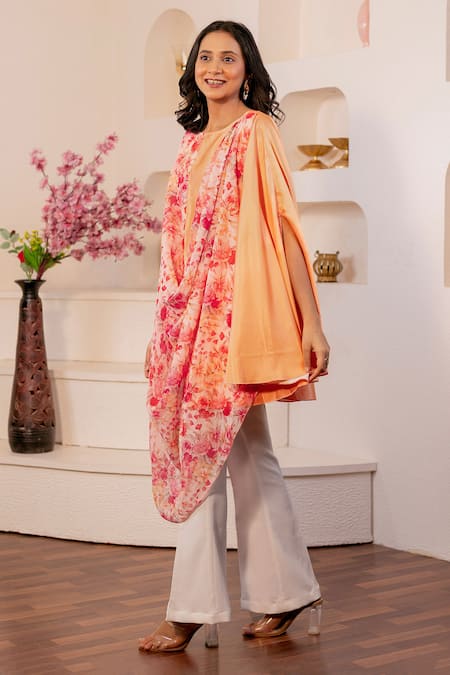 B'Infinite_Orange Chiffon, Satin Round Neck Primrose Print Draped Top_at_Aza_Fashions