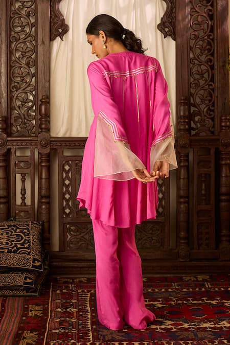 Shop Inej Pink Cotton, Silk Sequins, Tassels Embroidered Asymmetric Kurta And Pant Set at Aza Fashions Shop_Inej_Pink Cotton, Silk Sequins, Tassels Embroidered Asymmetric Kurta And Pant Set _at_Aza_Fashions