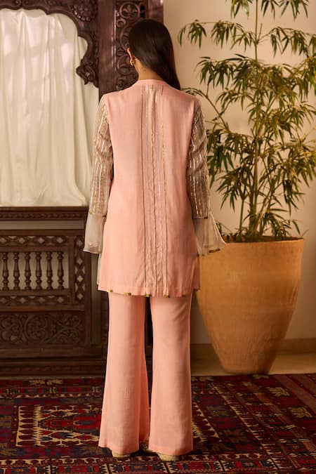 Shop Inej Peach Cotton, Silk Beads Bandeau Neck Embroidered Front Tunic And Pant Set at Aza Fashions Shop_Inej_Peach Cotton, Silk Beads Bandeau Neck Embroidered Front Tunic And Pant Set _at_Aza_Fashions