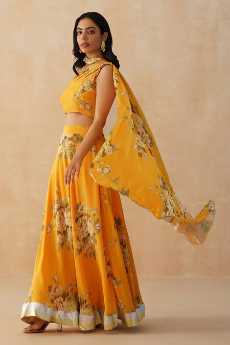Palak & Mehak Yellow Crepe Lace, Embroidery Asymmetric Floral Print Lehenga Blouse Set at Aza Fashions Palak & Mehak_Yellow Crepe Lace, Embroidery Asymmetric Floral Print Lehenga Blouse Set _at_Aza_Fashions