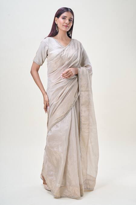 Samyukta Singhania_Beige Tissue Zari, Stones V-neck Embroidered Saree With Blouse_Online_at_Aza_Fashions