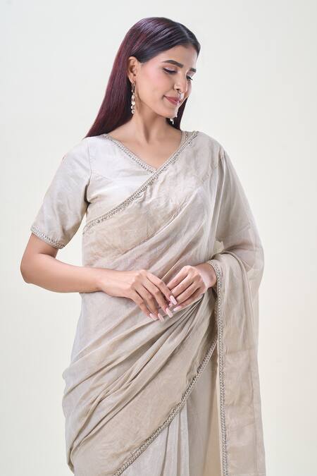 Shop_Samyukta Singhania_Beige Tissue Zari, Stones V-neck Embroidered Saree With Blouse_Online_at_Aza_Fashions