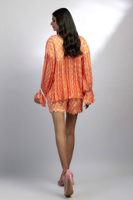 Ewoke Orange Chiffon Collared Tangello Print Ruffle Cuff Top With Shorts at Aza Fashions Ewoke_Orange Chiffon Collared Tangello Print Ruffle Cuff Top With Shorts _at_Aza_Fashions