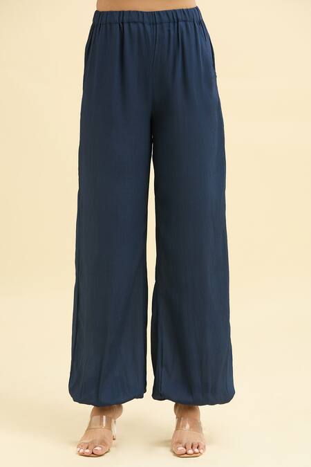 Amrta By Guneet Kondal_Blue Viscose Glitter Asymmetric Love Me Knot Top And Pant Co-ord Set_at_Aza_Fashions