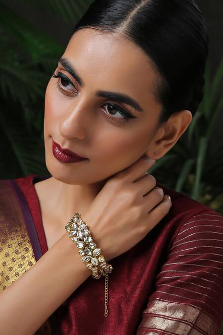 Paisley Pop Gold Plated Pearls, Gota Patti Floral Kundan And Embellished Bracelet Online at Aza Fashions Paisley Pop_Gold Plated Pearls, Gota Patti Floral Kundan And Embellished Bracelet _Online_at_Aza_Fashions