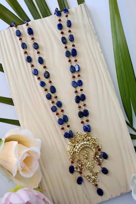 Shop Paisley Pop Blue Half Crescent Carved Pendant Necklace at Aza Fashions Shop_Paisley Pop_Blue Half Crescent Carved Pendant Necklace _at_Aza_Fashions