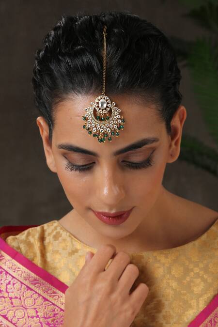 Paisley Pop Green Half Crescent Carved Maangtikka Online at Aza Fashions Paisley Pop_Green Half Crescent Carved Maangtikka _Online_at_Aza_Fashions