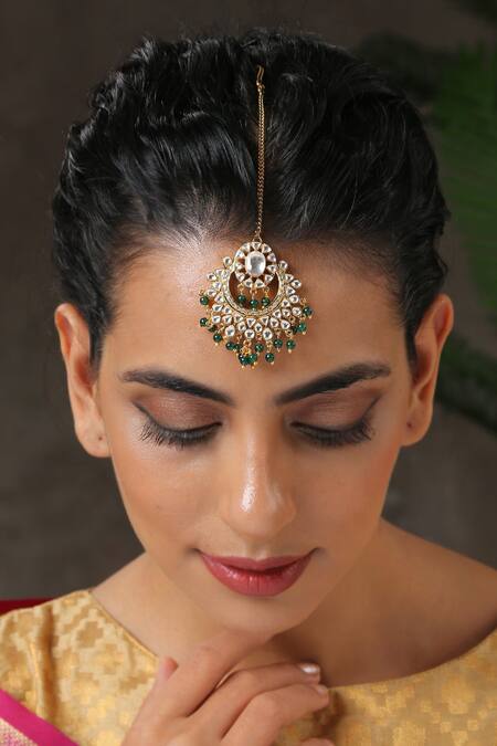 Shop Paisley Pop Green Half Crescent Carved Maangtikka Online at Aza Fashions Shop_Paisley Pop_Green Half Crescent Carved Maangtikka _Online_at_Aza_Fashions